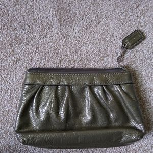 Coach pattern leather wristlet